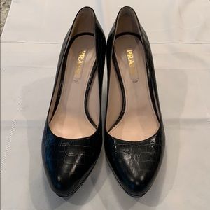 Prada crocodile pumps.